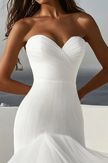 Robe de mariée bustier sans bretelles à volants ivoire en tulle sirène